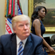 In this March 12, 2017 file photo, White House Director of communications for the Office of Public Liaison Omarosa Manigault, right, walks past President Donald Trump during a meeting on healthcare in the Roosevelt Room of the White House in Washington. Manigault Newman, who was fired in December, released a new book “Unhinged,” about her time in the White House.